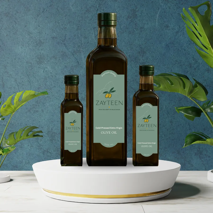 Filled bottles of olive oil ready for labelling